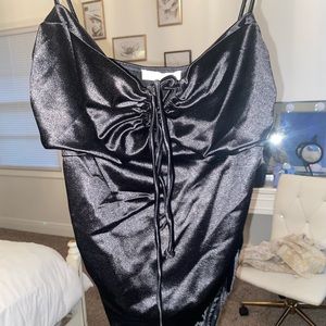Solid satin-feeling black bodysuit . Size large